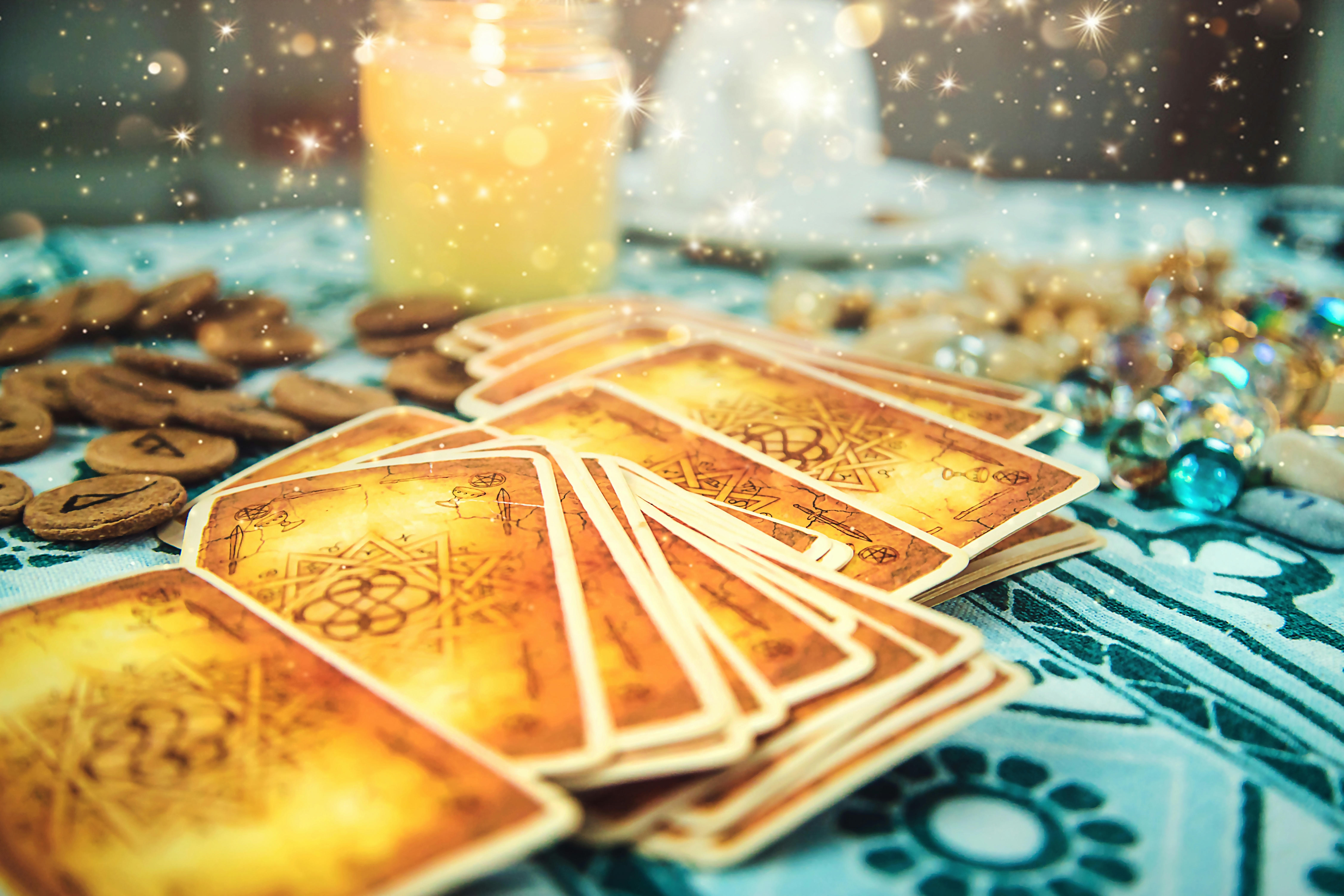 Image of orange tarot cards prior to a reading
